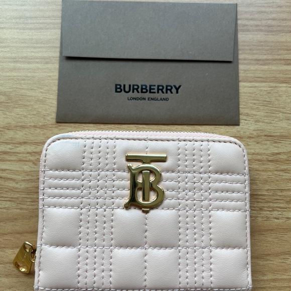 Burberry Handbags - Burberry Cream Quilted Wallet with Gold Monogram